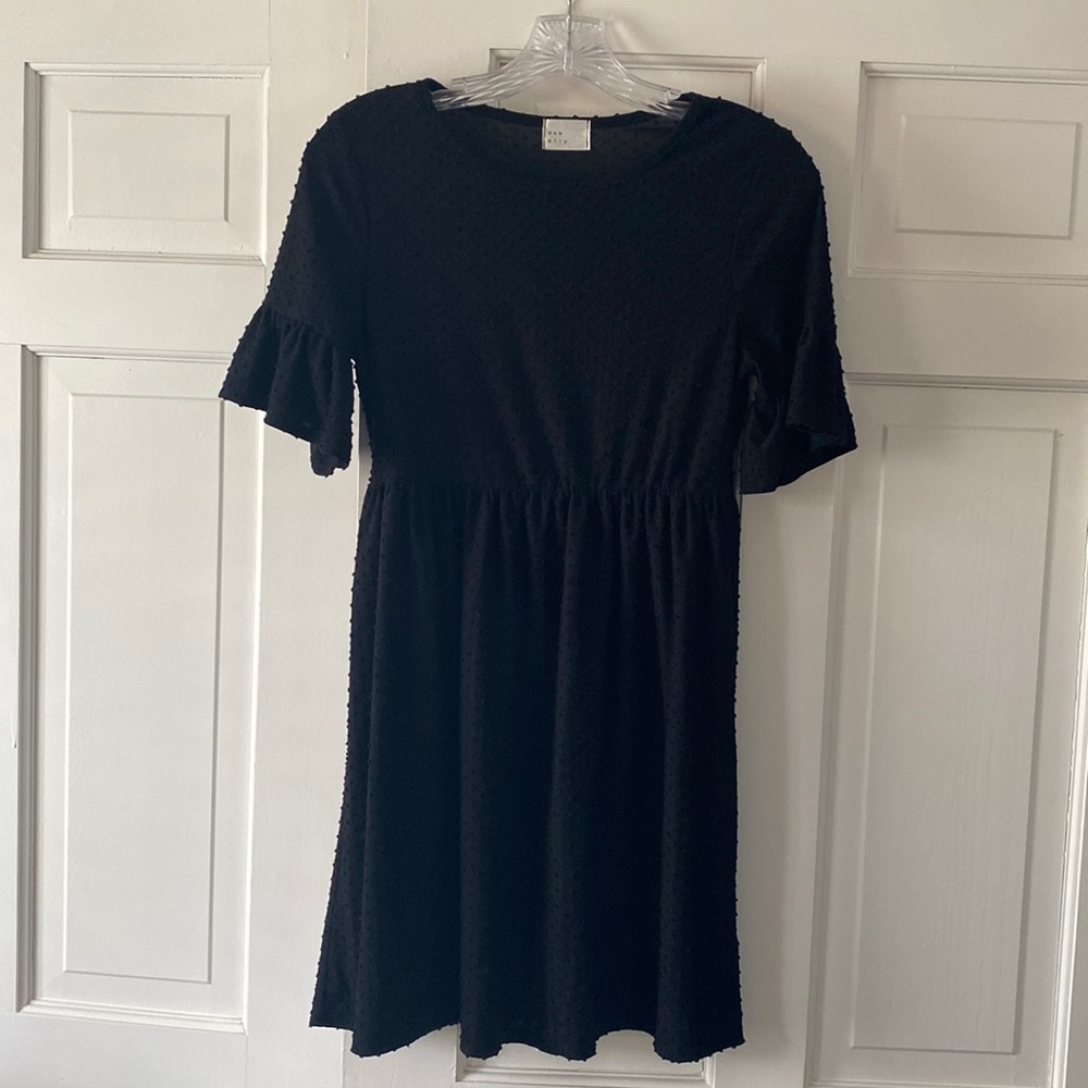 Black Swiss dot empire waist dress from Francesca’s